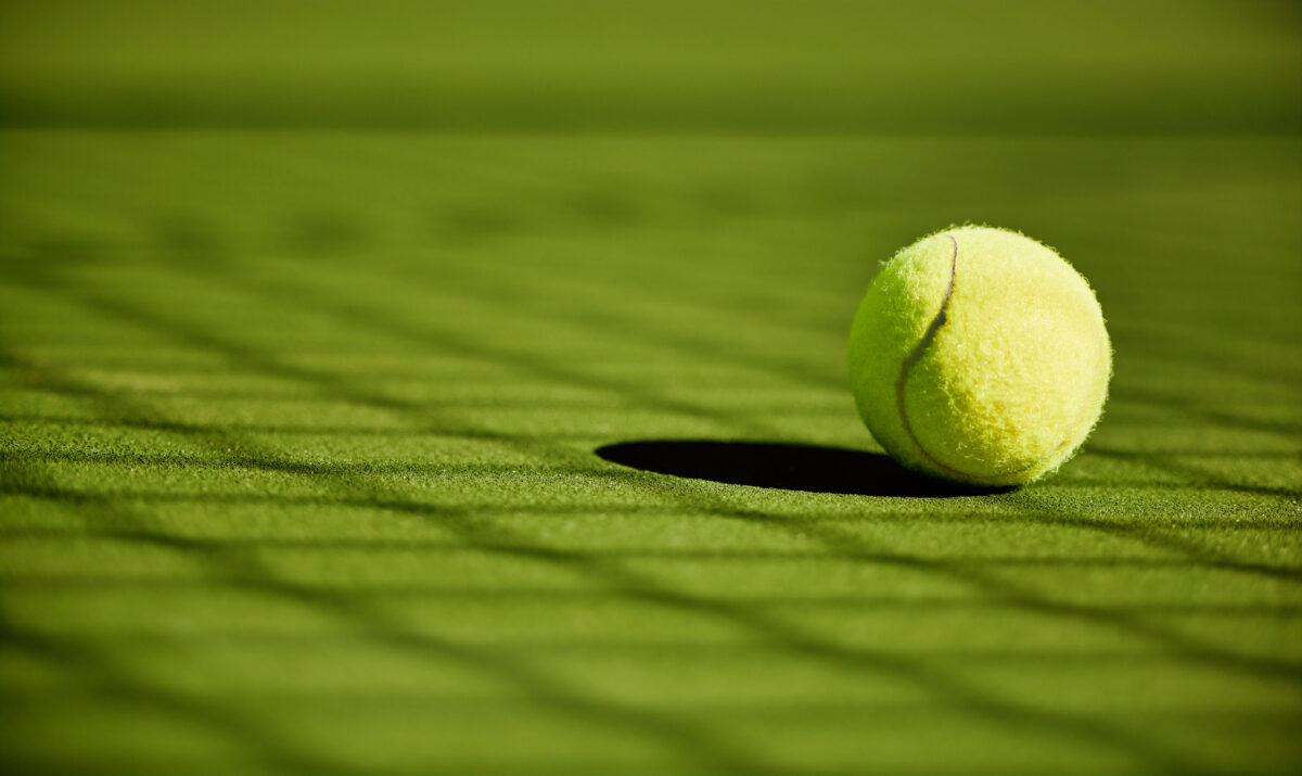 Artificial turf tennis court