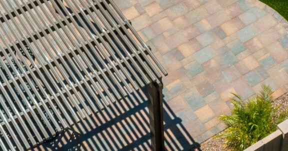 Paver patio and pergola installed by Alpine Turf